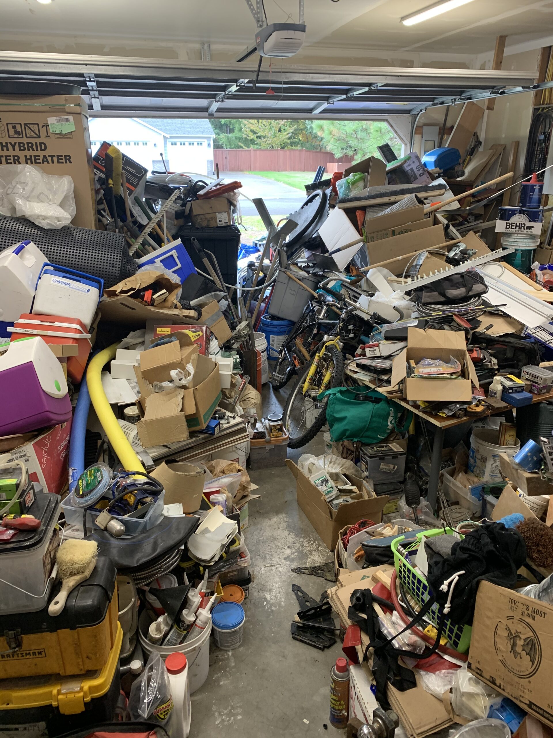Hoarder house cleanout in Piuyallup WA with heavy clutter and trash removal